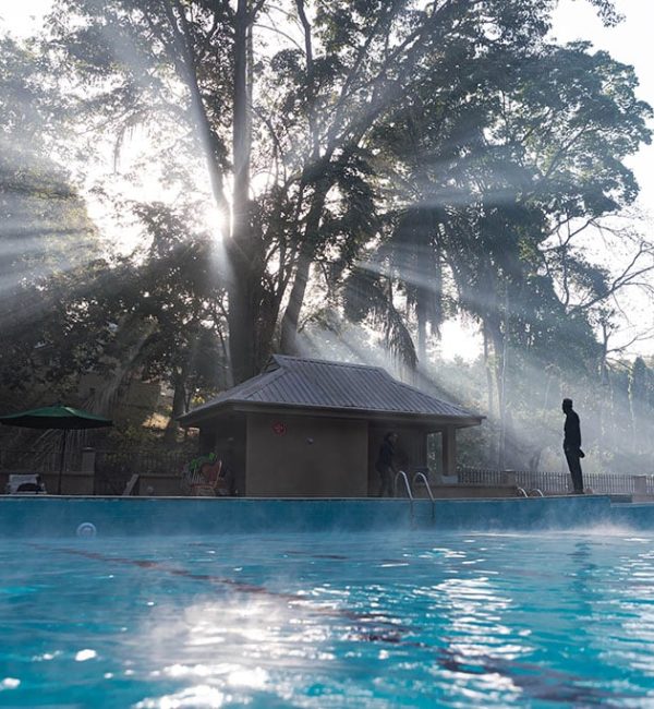 Early morning at the swimming pool. The warm water causes a magical mist (particularly in the harmattan cold) that lingers above the pool, inspiring one of the most mystical scenes you can witness.