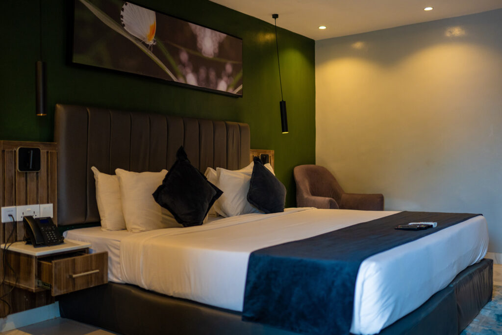 Accommodation Types 2 executive room ikogosi resort bedroom